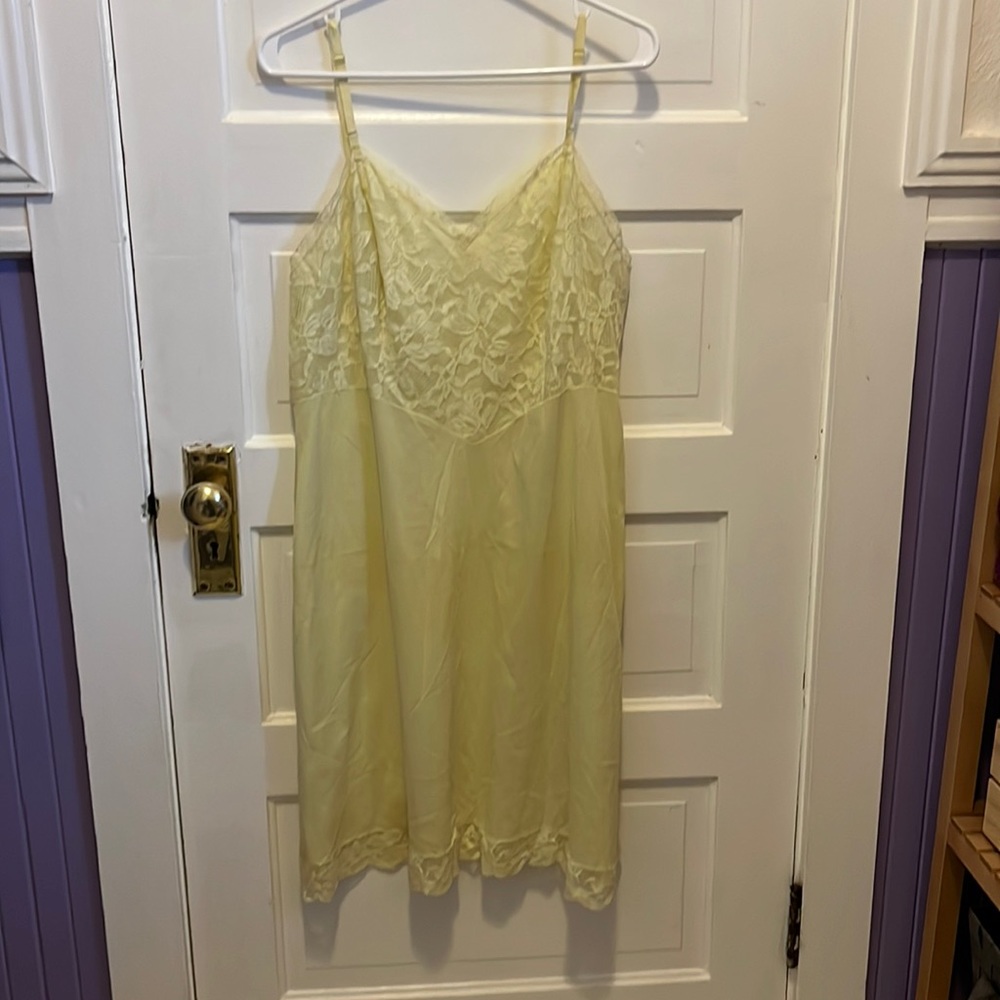 Yellow vintage slip. Excellent vintage condition.